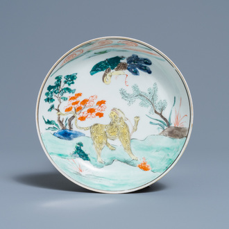 A Chinese famille verte 'tiger and phoenix' saucer, 19th C.
