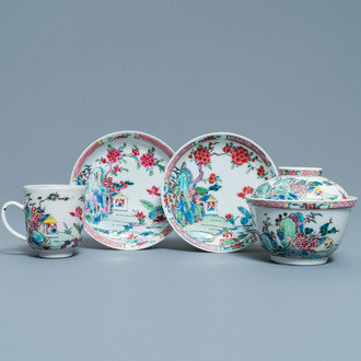 A Chinese famille rose covered bowl, a cup and two saucers with landscape design, Yongzheng