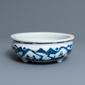 A Chinese blue and white tripod censer with figures in a mountainous landscape, Kangxi