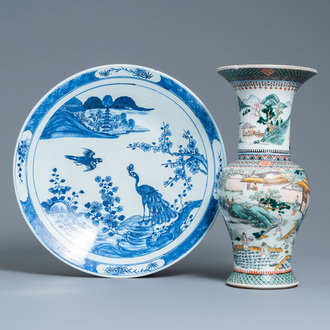 A Chinese famille verte 'yenyen' 'rice production' vase and a large blue and white 'peacock' dish, 19th C.