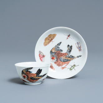 A Chinese famille rose 'bird and insects' cup and saucer, Yongzheng