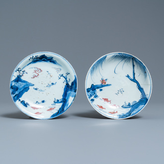 Two Chinese blue, white and copper-red 'fish' plates, Transitional period