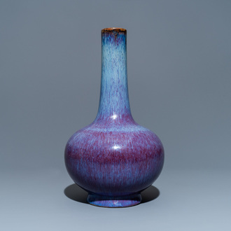 A Chinese flambé-glazed bottle vase, Kangxi mark, 19th C.