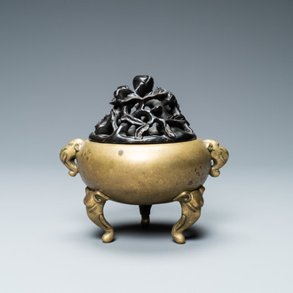A Chinese bronze censer with elephant head handles and feet, Qianlong mark and of the period