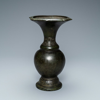 A Chinese bronze vase with incised taotie masks, Song/Yuan