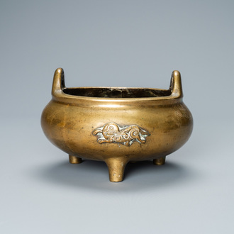 A Chinese bronze tripod 'elephants' censer, Qing
