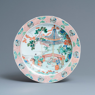 A Chinese famille verte dish with figures in a landscape, Kangxi