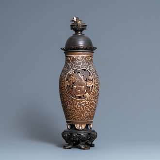 A Chinese reticulated biscuit 'Buddhist lions' vase mounted as a lamp, 19th C.