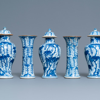A Chinese blue and white five-piece garniture with grapevines, Kangxi