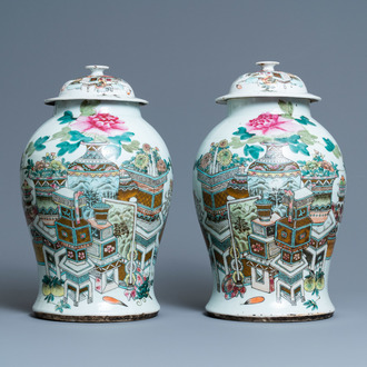 A pair of Chinese qianjiang cai vases and covers with antiquities, 19/20th C.