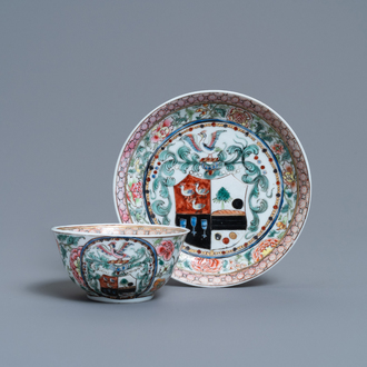 A Chinese famille rose armorial cup and saucer, Yongzheng