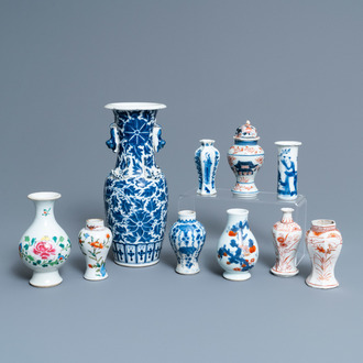 Ten mostly Chinese blue and white, famille rose and Imari-style vases, Kangxi and later