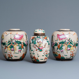 A pair of Chinese famille rose Nanking crackle-glazed jars and a jar with cover, 19th C.
