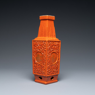 A Chinese monochrome coral-red relief-molded vase, 19/20th C.