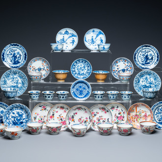 Twenty-two Chinese blue and white and famille rose cups and nineteen saucers, Kangxi and later