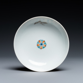 A Chinese doucai saucer, Yongzheng mark, 19/20th C.