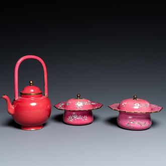 A Chinese ruby-ground Canton enamel teapot and a pair of covered bowls, Qianlong/Jiaqing