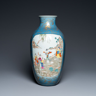 A Chinese famille rose gilt-decorated blue-ground vase, 18/19th C.