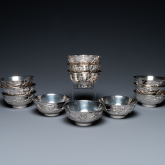 Twelve Chinese silver 'dragon and phoenix' bowls, Republic