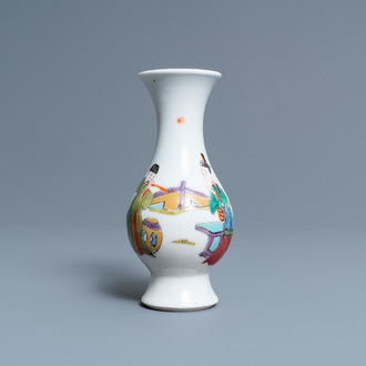 A Chinese famille rose vase with a man and a woman in a garden, Yongzheng