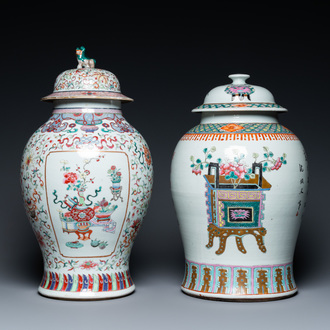 Two Chinese famille rose vases and covers, 19th C.