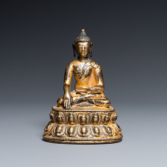 A Sino-Tibetan gilt bronze figure of Buddha Shakyamuni, 17th C.