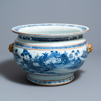 A large Chinese blue and white fish bowl with landscape design, Qianlong