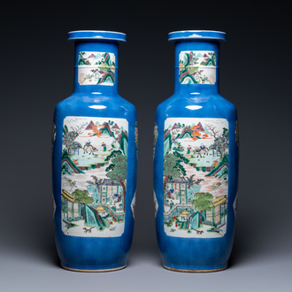 A pair of Chinese famille verte powder-blue ground vases, Kangxi mark, 19th C.