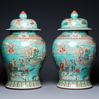 A pair of large Chinese turquoise-ground famille verte vases and covers, 19th C.