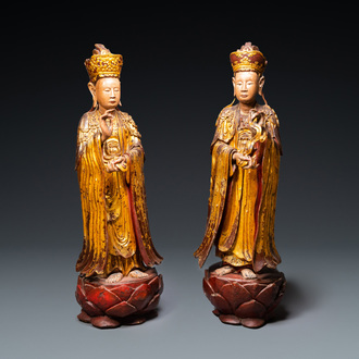 A pair of large Chinese or Vietnamese gilded, lacquered and painted wooden figures, 18/19th C.