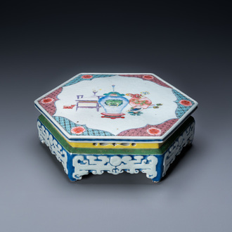 A Chinese famille rose hexagonal 'antiquities' stand, Yongzheng