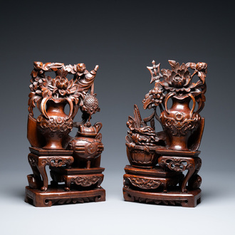 A pair of Chinese wood carvings, 19th C.