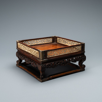 A Chinese square wooden tray with reticulated carved bone side panels, 18/19th C.