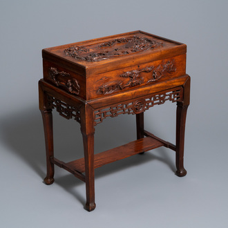 A Chinese wooden casket on stand, 19/20th C.