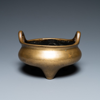 A Chinese bronze tripod censer, Xuande mark, 19th C.