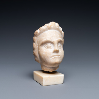 A Roman provicincial marble head of a boy, 2nd/3rd C.