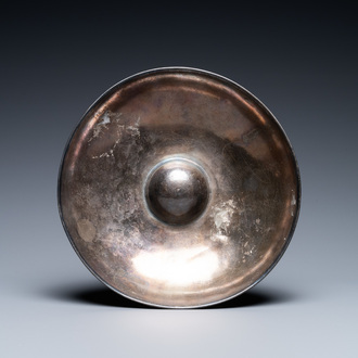 A Persian silver bowl with raised center, 8/12th C.