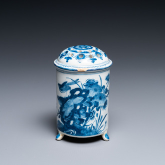 A Dutch Delft blue and white tripod caster with birds near blossoms, 1st half 18th C.