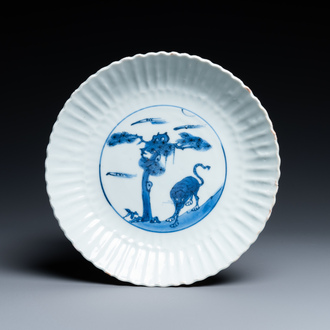 A Chinese blue and white chysanthemum-moulded ko-sometsuke 'tiger' dish for the Japanese market, Tianqi/Chongzhen