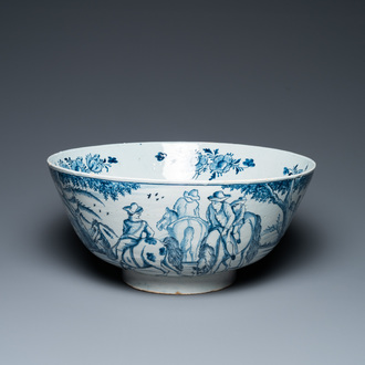 A large Dutch Delft blue and white bowl with shepherds on horsebacks, 18th C.