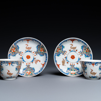 A pair of Chinese famille rose cups and saucers with aquatic birds, Qianlong