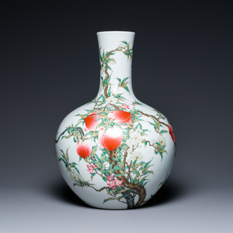 A Chinese famille rose 'nine peaches' tianqiu ping vase, Qianlong mark, 20th C.