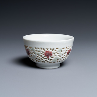 A Chinese reticulated double-walled cup with copper-red and celadon spots, Yongzheng