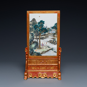 A Chinese famille rose table screen with a winter landscape and a scene with Europeans, various seals, Qianlong mark, 18/19th C.