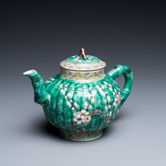 A Chinese ribbed verte biscuit teapot and cover, Kangxi