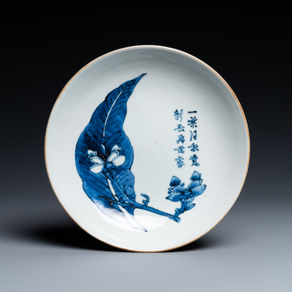 A Chinese blue and white 'magnolia, leaf and poem' dish, Shunzhi