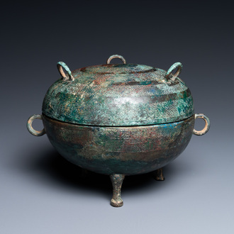 A Chinese bronze ritual tripod 'dui' food vessel and cover, Eastern Zhou