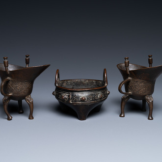 Two Chinese small bronze 'jue' ewers and a tripod censer, probably Yuan