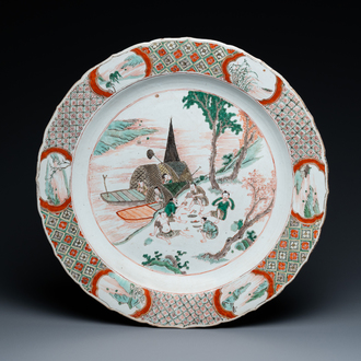 A Chinese famille verte dish with a kissing couple in a boat, Kangxi