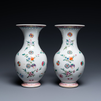 A pair of Chinese famille rose vases, Yongzheng mark, 19/20th C.